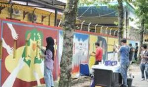 Tembok Kantor Camat Medan Helvetia Dilukis Seniman
