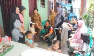 Wujudkan Balita Sehat, Babinsa Dampingi Pelaksanaan Posyandu Di Wilayah Binaan