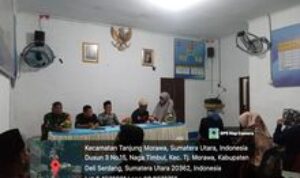 Giat Babinsa Koramil 0201-16/TM Hadiri Rapat Perencanaan MTQ di Kantor Desa Naga Timbul