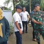 Sinergitas Babinsa dan Kelurahan Tg. Gusta Cegah Bencana Akibat Hujan
