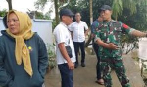 Sinergitas Babinsa dan Kelurahan Tg. Gusta Cegah Bencana Akibat Hujan