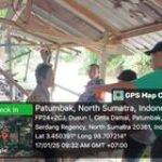 Babinsa Sertu Adesmar Lakukan Pengecekan Debit Air Sungai di Patumbak