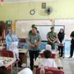 Babinsa Koramil 0201-02/MT Memonitor Kegiatan Running Makan Bergizi untuk Anak Sekolah di Medan Timur