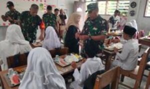 Danramil 0201-05/MB Dan Babinsa Dampingi Program Makan Siang Sehat Bergizi Kodam I/BB di YAPDI
