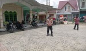 Personil Polsek Porsea Laksanakan Pengamanan Shalat Jum'at