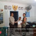 Babinsa Koramil 0201-14/PB Dampingi Penyaluran BLT di Desa Cinta Rakyat