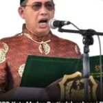 Ketua DPRD Kota Medan bertindak sebagai pembaca teks proklamasi dalam upacara pengibaran Bendera Perigatan Hari Ulang Tahun ke-80 Kemerdekaan Republik